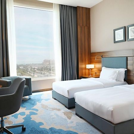 Bay La Sun Hotel And Marina - Emaar King Abdullah Economic City Kültér fotó A room at the hotel