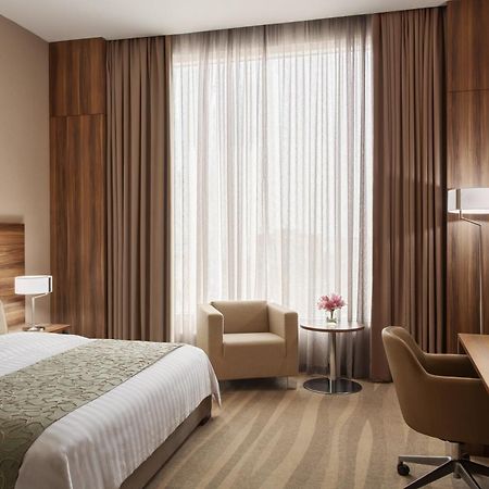 Bay La Sun Hotel And Marina - Emaar King Abdullah Economic City Kültér fotó A room at the hotel
