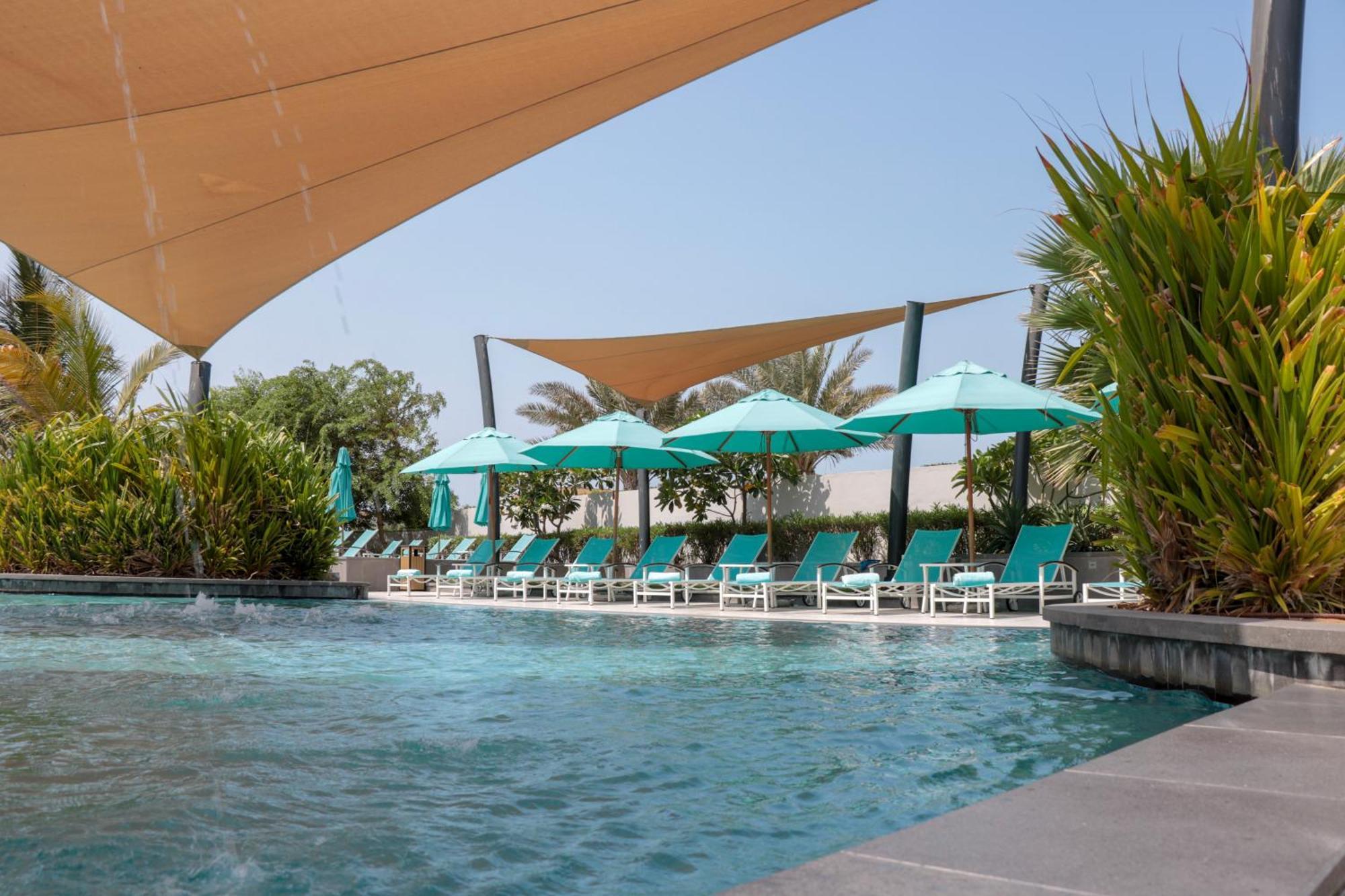 Bay La Sun Hotel And Marina - Emaar King Abdullah Economic City Kültér fotó The swimming pool at the hotel