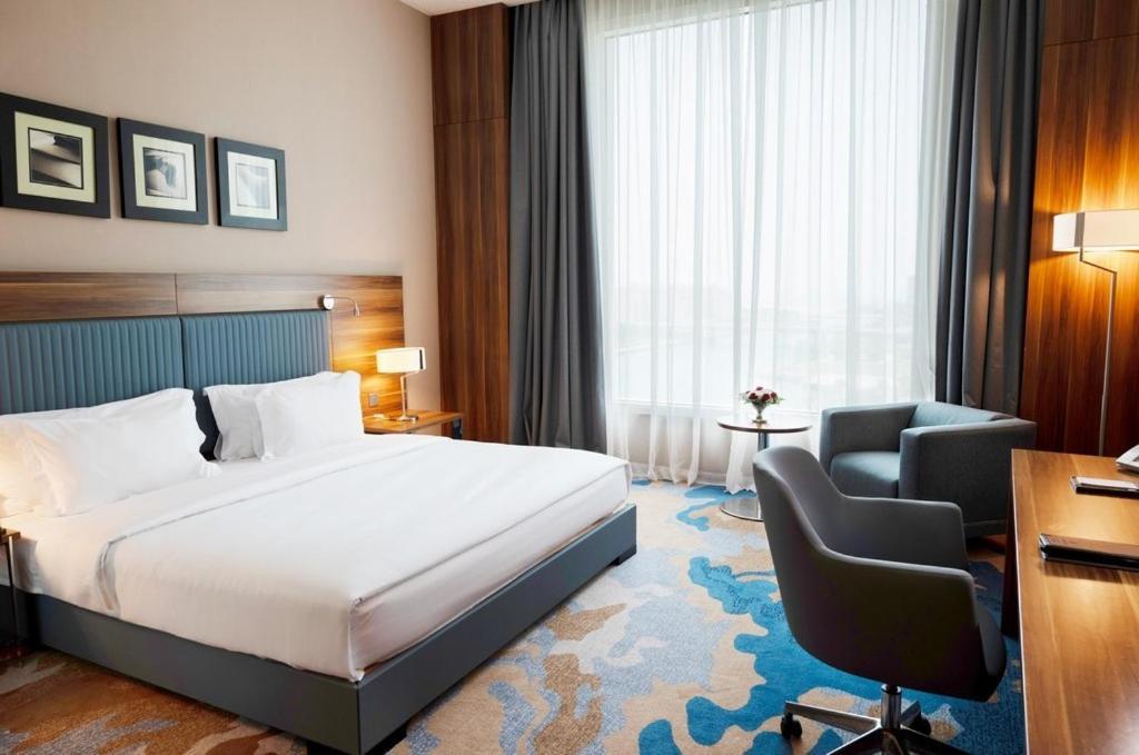 Bay La Sun Hotel And Marina - Emaar King Abdullah Economic City Kültér fotó A room at the hotel