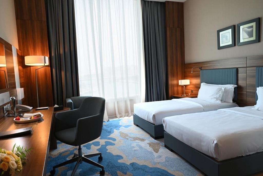 Bay La Sun Hotel And Marina - Emaar King Abdullah Economic City Kültér fotó A room at the hotel
