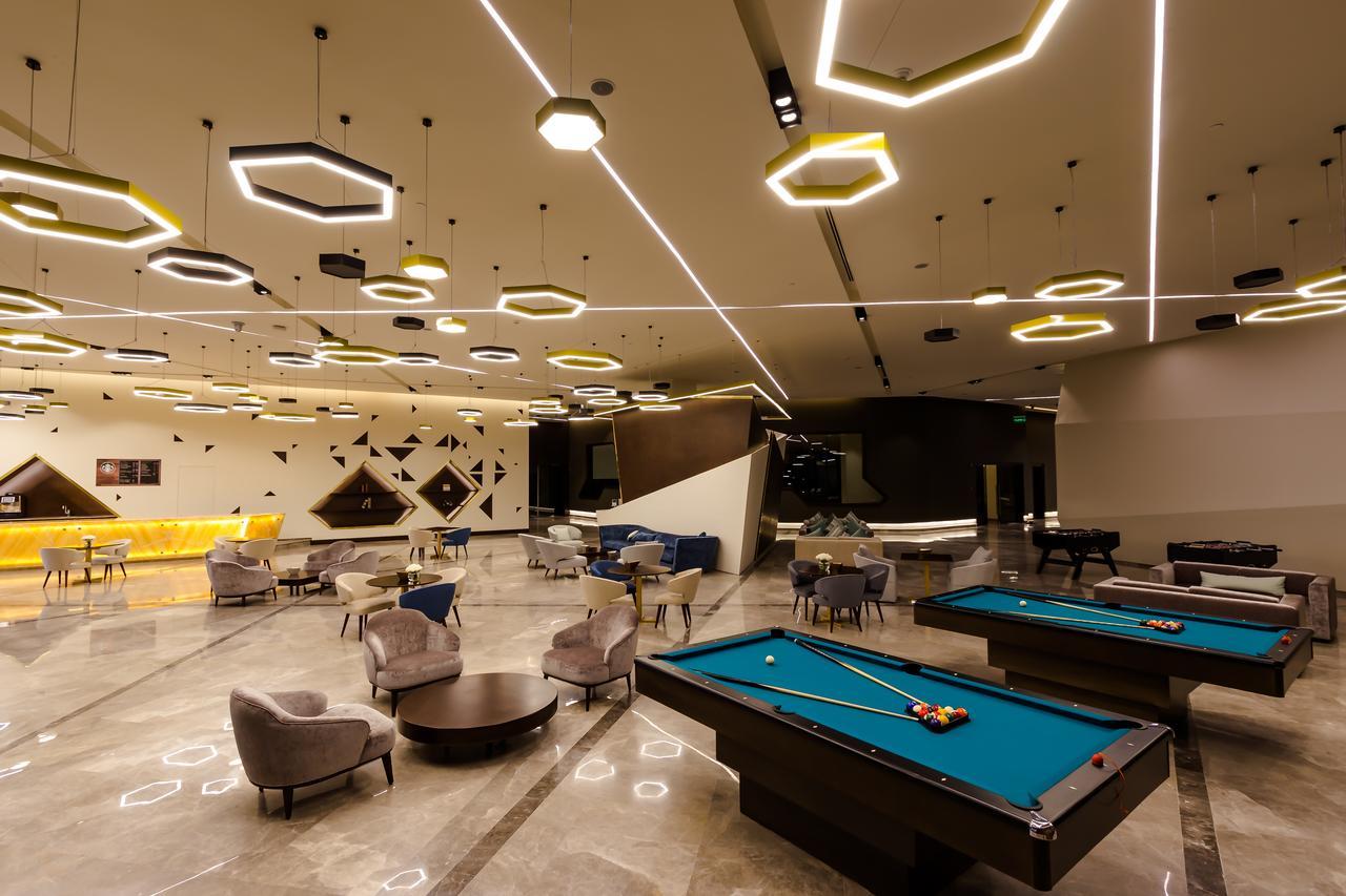 Bay La Sun Hotel And Marina - Emaar King Abdullah Economic City Kültér fotó The lounge at the airport